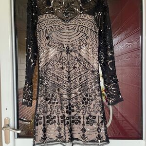 Brand new dress!! Perfect for formal or holiday parties!!! Size 4/6